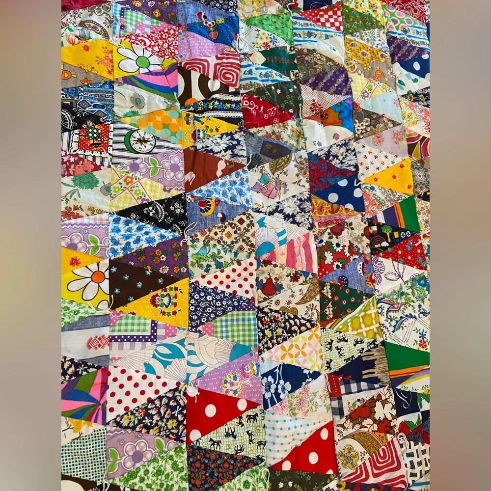 Vintage hand made quilt triangular fabric with solid reverse side